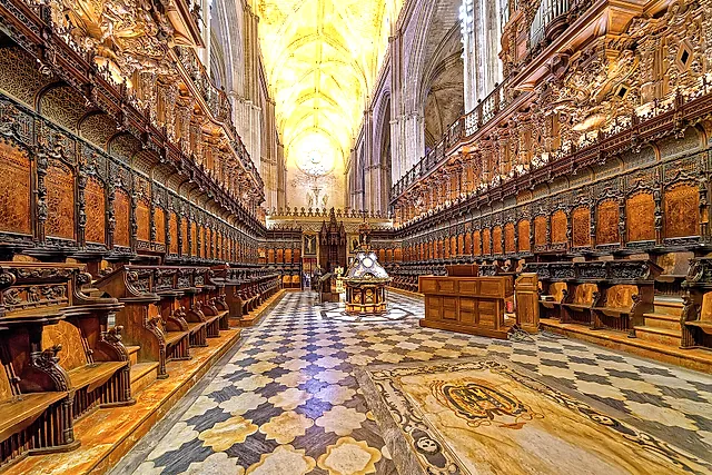 The carved wooden choir stalls in the middle of the nave